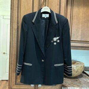 The La Costa Spa vintage black blazer.  Size 12. Piling on the outside.